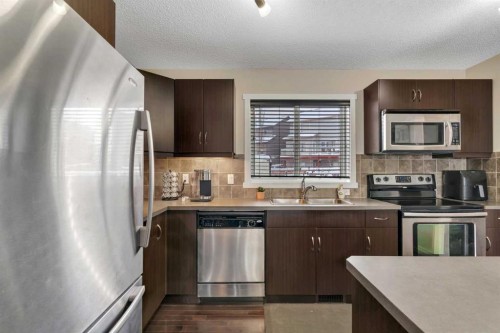 124 Panamount Way Nw, Calgary, AB - Indoor Photo Showing Kitchen With Stainless Steel Kitchen