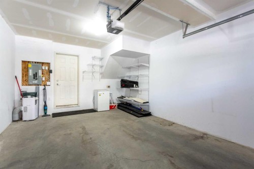 107 Evanston Manor Nw, Calgary, AB - Indoor Photo Showing Garage