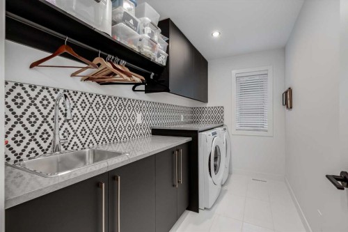 44 Timberline Way Sw, Calgary, AB - Indoor Photo Showing Laundry Room