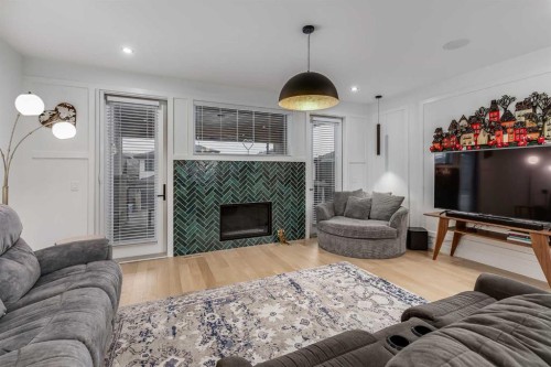 44 Timberline Way Sw, Calgary, AB - Indoor Photo Showing Living Room With Fireplace