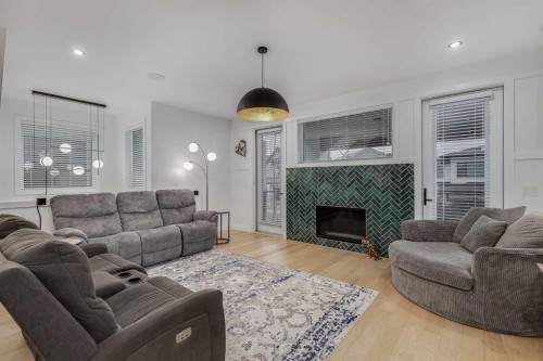 44 Timberline Way Sw, Calgary, AB - Indoor Photo Showing Living Room With Fireplace