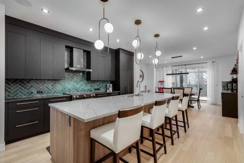 44 Timberline Way Sw, Calgary, AB - Indoor Photo Showing Kitchen With Upgraded Kitchen