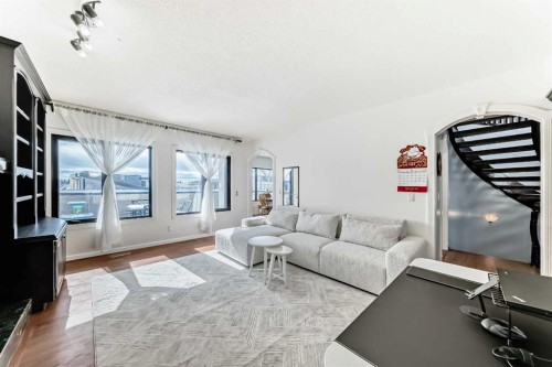 40 Christie Cairn Square Sw, Calgary, AB - Indoor Photo Showing Living Room
