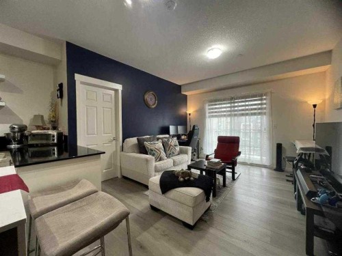 3313-99 Copperstone Park, Calgary, AB - Indoor Photo Showing Living Room