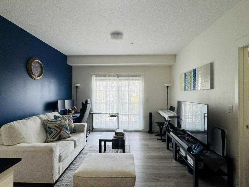 3313-99 Copperstone Park, Calgary, AB - Indoor Photo Showing Living Room