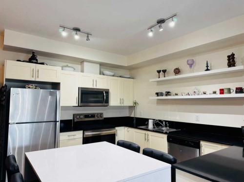 3313-99 Copperstone Park, Calgary, AB - Indoor Photo Showing Kitchen With Stainless Steel Kitchen With Double Sink