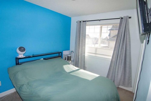 132 Copperpond Boulevard Se, Calgary, AB - Indoor Photo Showing Bedroom