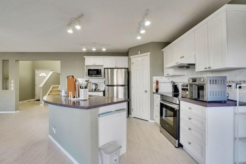 328 Tuscany Valley View Nw, Calgary, AB - Indoor Photo Showing Kitchen
