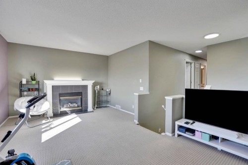 328 Tuscany Valley View Nw, Calgary, AB - Indoor With Fireplace