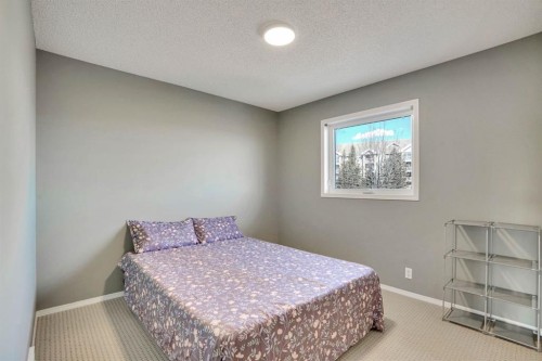 328 Tuscany Valley View Nw, Calgary, AB - Indoor Photo Showing Bedroom