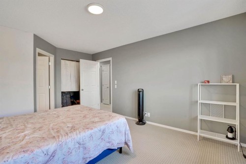 328 Tuscany Valley View Nw, Calgary, AB - Indoor Photo Showing Bedroom