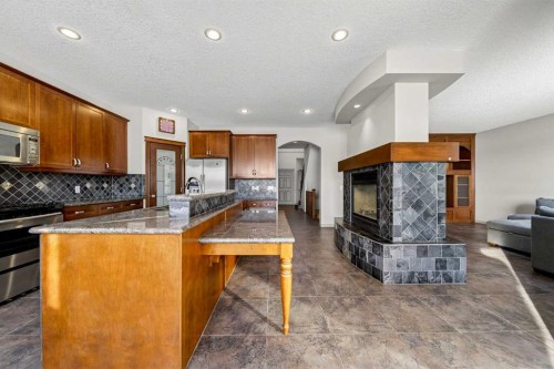 14 Springborough Crescent Sw, Calgary, AB - Indoor Photo Showing Kitchen With Fireplace