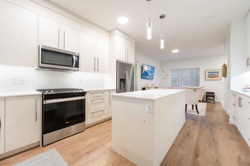 7411 202 Avenue Se, Calgary, AB - Indoor Photo Showing Kitchen With Upgraded Kitchen
