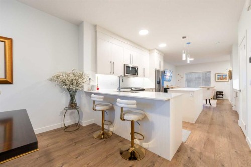 7411 202 Avenue Se, Calgary, AB - Indoor Photo Showing Kitchen With Upgraded Kitchen