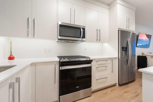 7411 202 Avenue Se, Calgary, AB - Indoor Photo Showing Kitchen With Upgraded Kitchen
