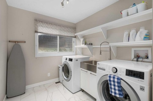 5689 Brenner Crescent Nw, Calgary, AB - Indoor Photo Showing Laundry Room