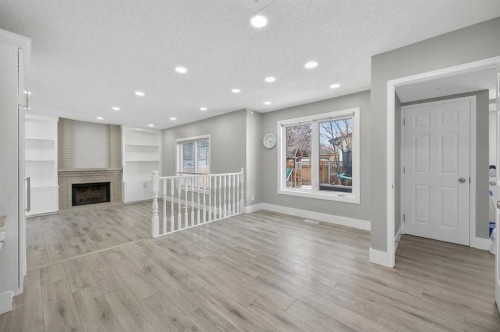 55 Millrise Way Sw, Calgary, AB - Indoor With Fireplace