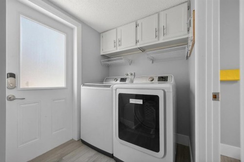 55 Millrise Way Sw, Calgary, AB - Indoor Photo Showing Laundry Room