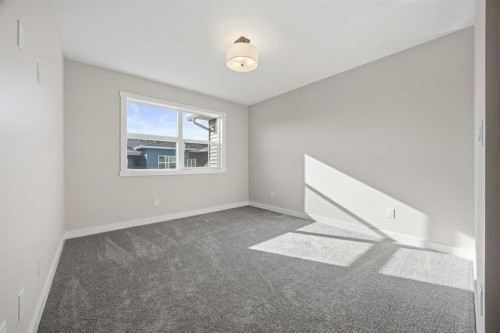1047 Bayview Crescent, Airdrie, AB - Indoor Photo Showing Other Room