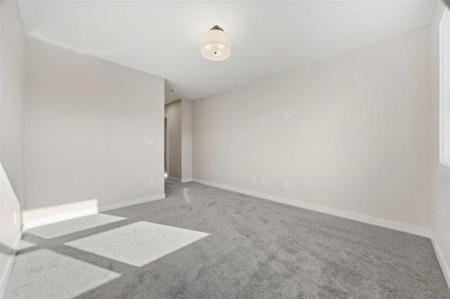 1047 Bayview Crescent, Airdrie, AB - Indoor Photo Showing Other Room