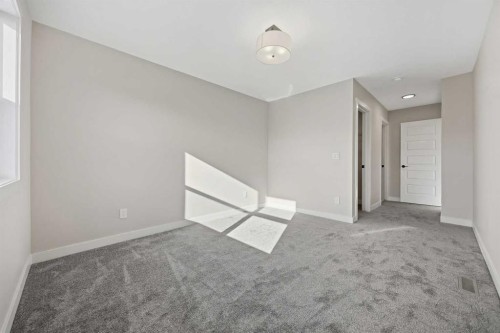 1047 Bayview Crescent, Airdrie, AB - Indoor Photo Showing Other Room