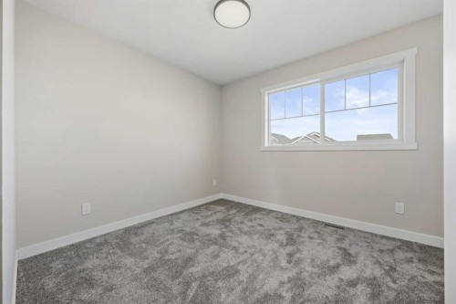 1047 Bayview Crescent, Airdrie, AB - Indoor Photo Showing Other Room