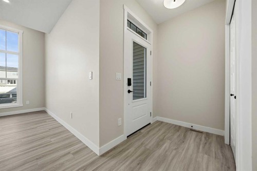1047 Bayview Crescent, Airdrie, AB - Indoor Photo Showing Other Room