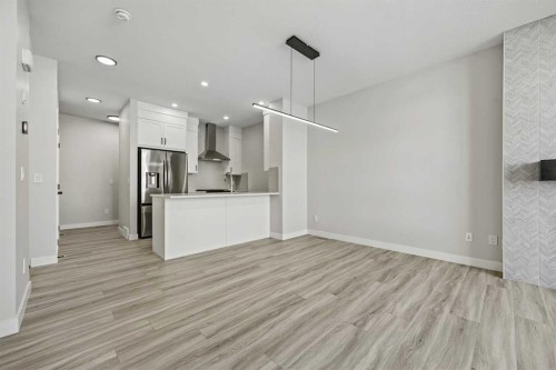 1047 Bayview Crescent, Airdrie, AB - Indoor Photo Showing Kitchen