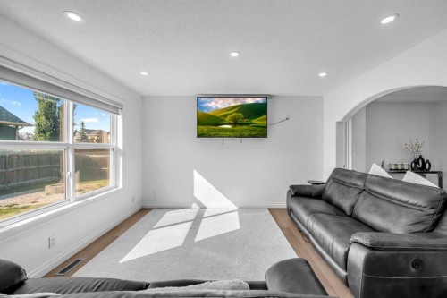 80 Canoe Square Sw, Airdrie, AB - Indoor Photo Showing Living Room