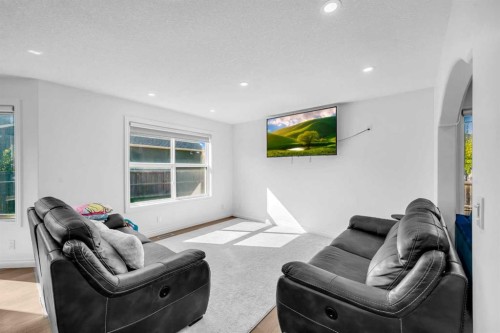 80 Canoe Square Sw, Airdrie, AB - Indoor Photo Showing Living Room
