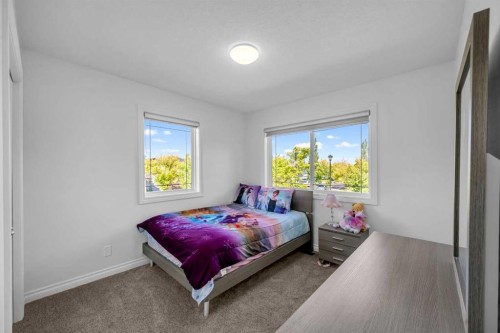 80 Canoe Square Sw, Airdrie, AB - Indoor Photo Showing Bedroom