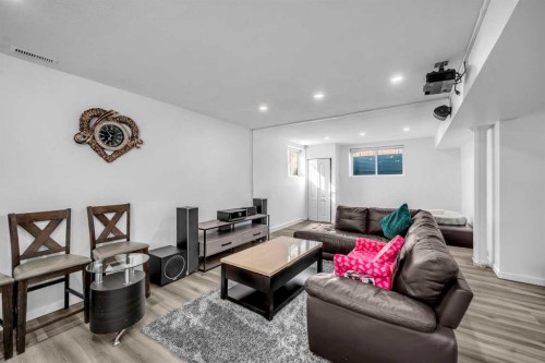 80 Canoe Square Sw, Airdrie, AB - Indoor Photo Showing Living Room