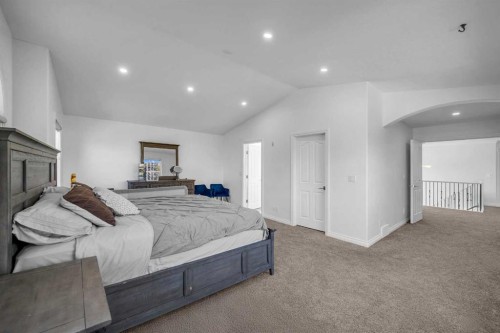 80 Canoe Square Sw, Airdrie, AB - Indoor Photo Showing Bedroom