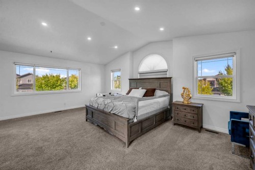 80 Canoe Square Sw, Airdrie, AB - Indoor Photo Showing Bedroom