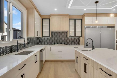 18 South Shore Road, Chestermere, AB - Indoor Photo Showing Kitchen With Double Sink With Upgraded Kitchen
