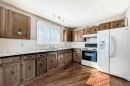2610 Dover Ridge Drive Se, Calgary, AB  - Indoor Photo Showing Kitchen With Double Sink 