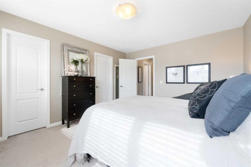 100 Evansborough Common Nw, Calgary, AB - Indoor Photo Showing Bedroom