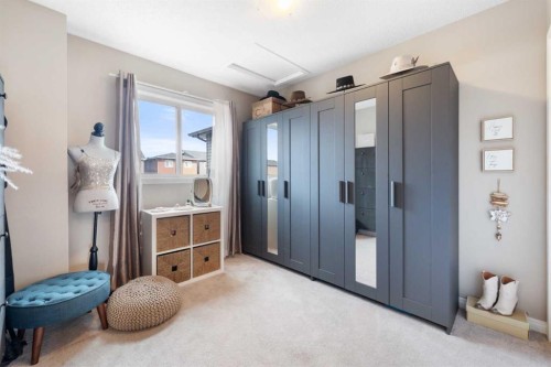 100 Evansborough Common Nw, Calgary, AB - Indoor Photo Showing Bedroom