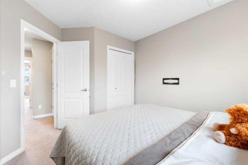 100 Evansborough Common Nw, Calgary, AB - Indoor Photo Showing Bedroom
