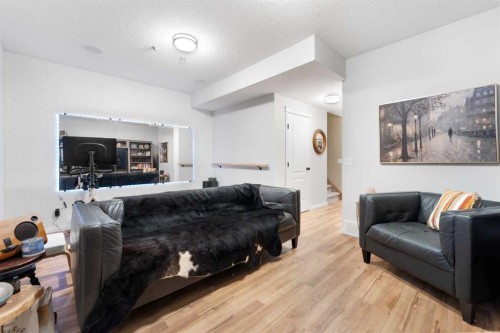 100 Evansborough Common Nw, Calgary, AB - Indoor Photo Showing Living Room