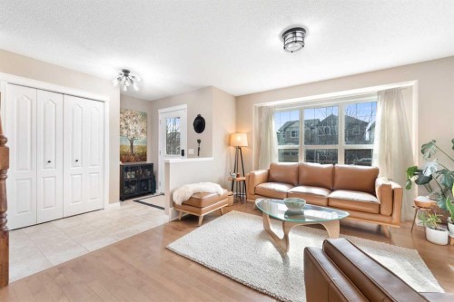 100 Evansborough Common Nw, Calgary, AB - Indoor Photo Showing Living Room