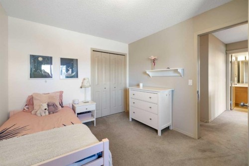 28 West Springs Close Sw, Calgary, AB - Indoor Photo Showing Bedroom