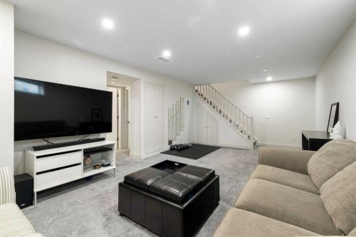 28 West Springs Close Sw, Calgary, AB - Indoor Photo Showing Living Room