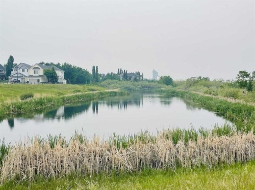28 West Springs Close Sw, Calgary, AB - Outdoor With Body Of Water With View
