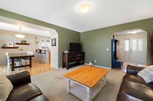 28 West Springs Close Sw, Calgary, AB - Indoor Photo Showing Living Room