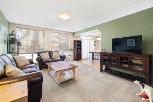 28 West Springs Close Sw, Calgary, AB - Indoor Photo Showing Living Room