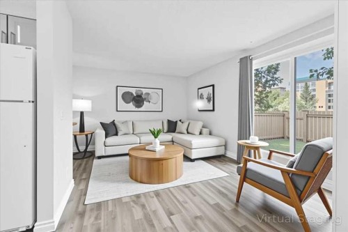 1101-1540 29 Street Nw, Calgary, AB - Indoor Photo Showing Living Room