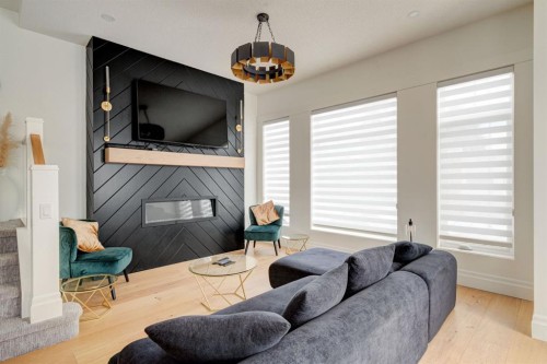 1804 20 Avenue, Calgary, AB - Indoor Photo Showing Living Room With Fireplace