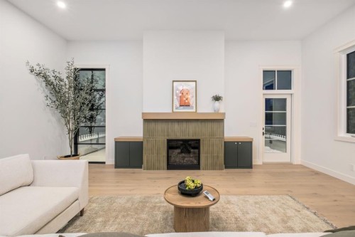 2945 Toronto Crescent Nw, Calgary, AB - Indoor Photo Showing Living Room With Fireplace