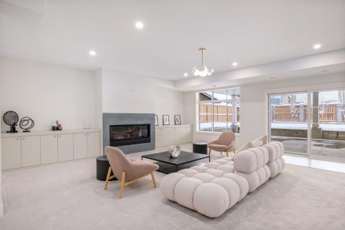 2945 Toronto Crescent Nw, Calgary, AB - Indoor Photo Showing Living Room With Fireplace